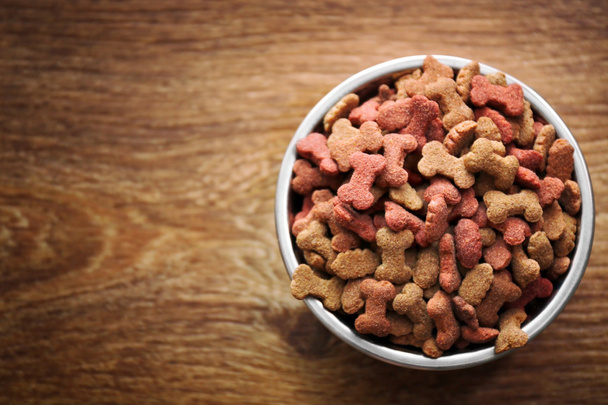 Dog food in bowl  - Фото, зображення