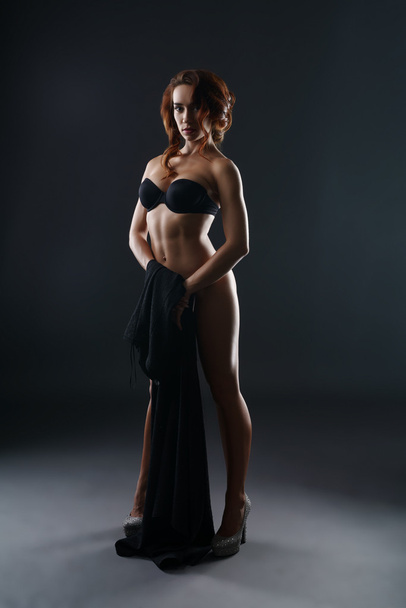 Nice girl with perfect body covering her nakedness - Zdjęcie, obraz