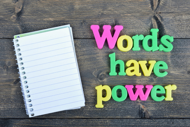 Words have power on wooden table - Foto, afbeelding