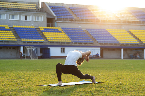 Yoga woman doing High Lunges Pose - Fotó, kép