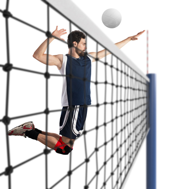 Jogador de voleibol batendo a bola
 - Foto, Imagem