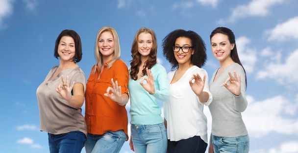 group of happy different size women showing ok - Foto, immagini