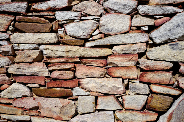 raue strukturierte Steinmauer - Foto, Bild