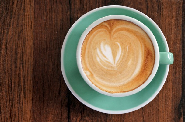 Плоский вигляд плоскої білої чашки кавового напою
 - Фото, зображення