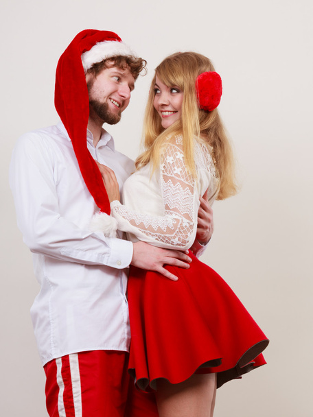 Couple in Christmas costuumes - Фото, изображение