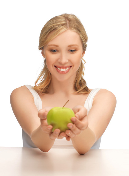 Woman with green apple - Zdjęcie, obraz