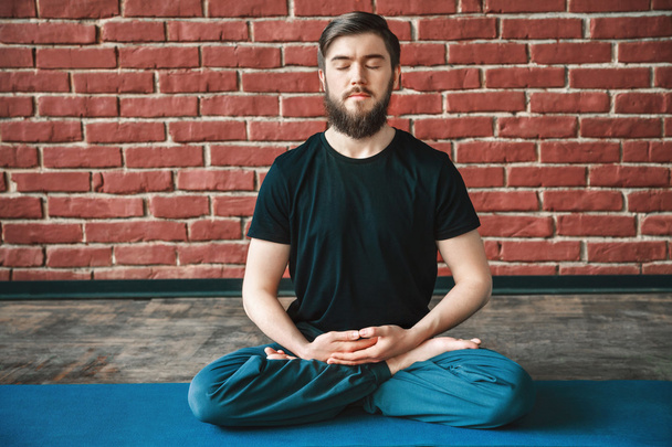 Yoga positions at wall background - Фото, зображення