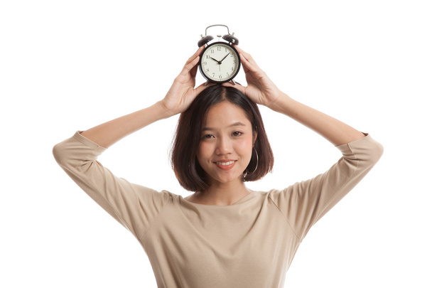 Jeune femme d'affaires asiatique sourire avec une horloge
 - Photo, image