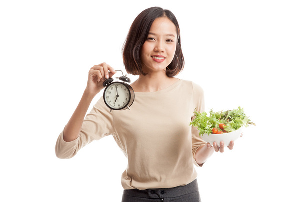 Młody azjatycki biznes kobieta z zegarem i sałatka - Zdjęcie, obraz
