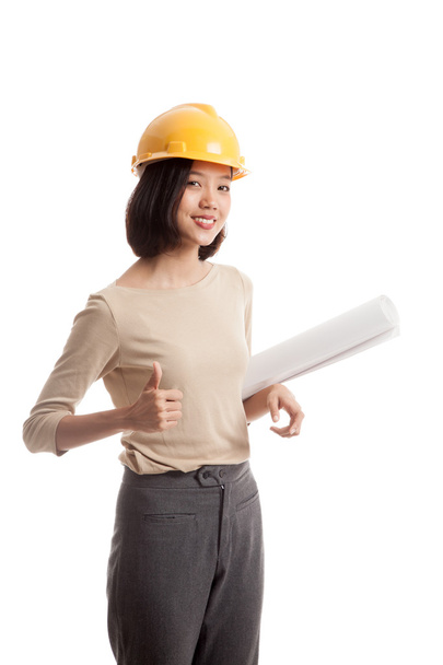 Asian engineer woman with blueprints show thumbs up - Foto, imagen