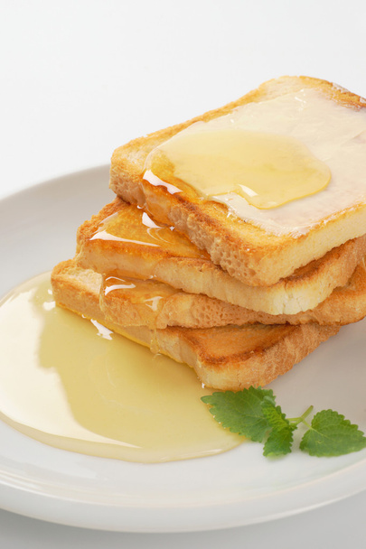 toast with butter and honey - Φωτογραφία, εικόνα