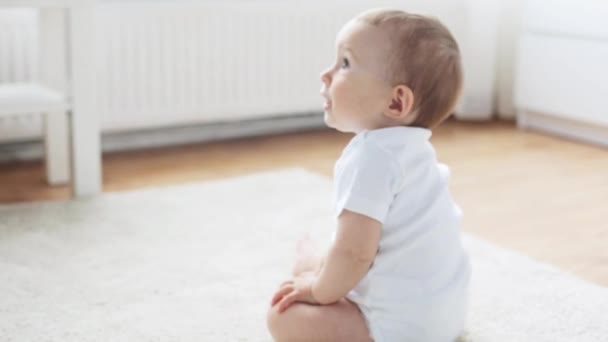 happy little baby crawling in living room at home 9 - Záběry, video