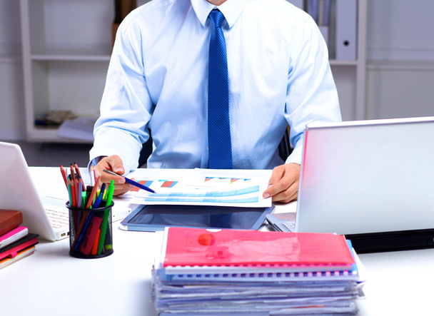 businessman working at a desk computer graphics - Photo, Image