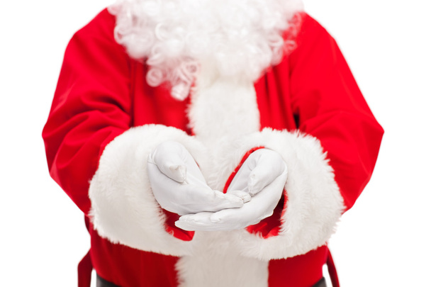 Santa Claus offering something - Фото, изображение