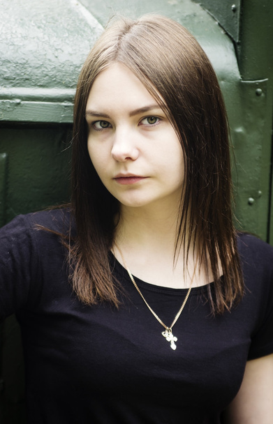 Beautiful girl in a black T-shirt, outdoor portrait - Valokuva, kuva