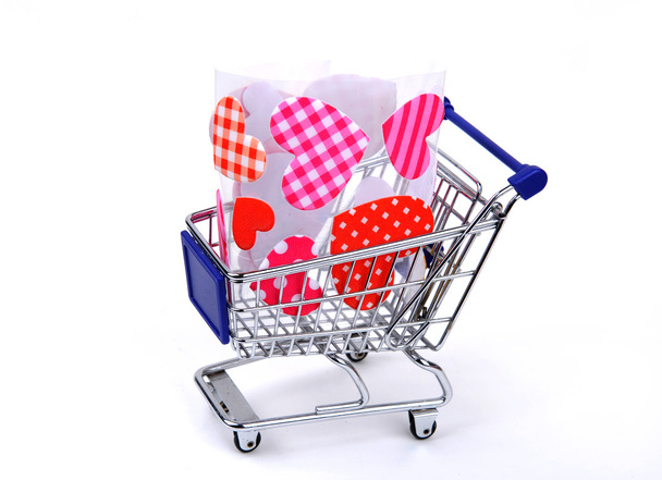 Coração vermelho com carrinhos de compras
 - Foto, Imagem