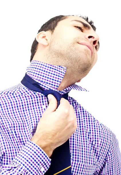 Hombre mostrando que una corbata es un verdadero dolor
 - Foto, imagen