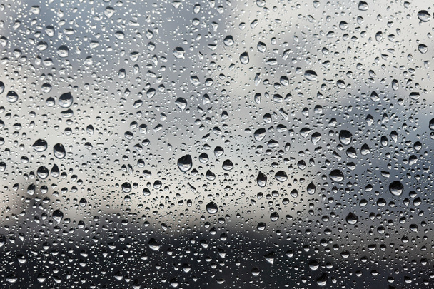 Krople deszczu na oknie szkło - Zdjęcie, obraz