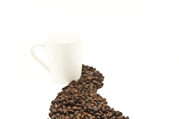 Coffee beans and coffee cup isolated on the white background - Photo, Image