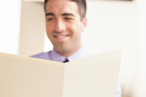 Cream folder with man smiling - Фото, изображение