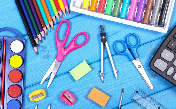 School accessories on blue boards, back to school concept - Photo, Image