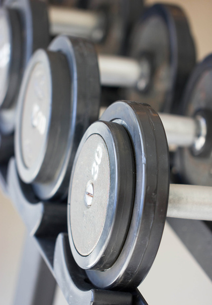 Close-up van Fitness oefening apparatuur halter gewichten. - Foto, afbeelding