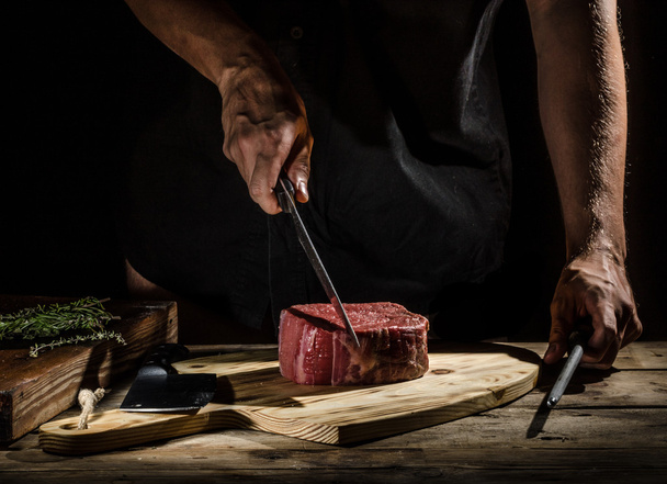 Chef butcher prepare beef steak - Photo, image