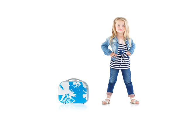 child with blue suitcase - Foto, Imagen