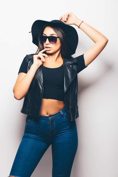beautiful fashion mulatto girl wearing sunglasses and black hat  - Photo, Image
