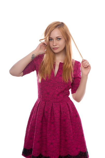 young beautiful girl with red hair in red dress isolated on white background - Zdjęcie, obraz