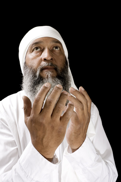 Arabi mies rukoilee
 - Valokuva, kuva