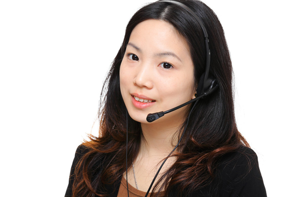 giovane donna d'affari asiatica con auricolare
 - Foto, immagini