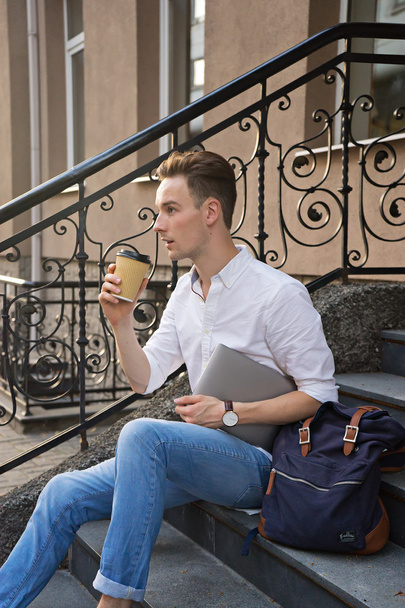 lifestyle theme. awesome man with laptop and cooffee - Photo, Image