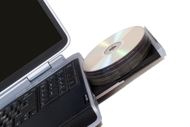 Portátil con unidad de DVD sobrecargada. Aislamiento
 - Foto, Imagen