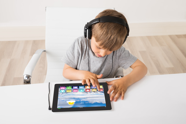 Little Boy Listening Music On Digital Tablet At Home - Fotoğraf, Görsel
