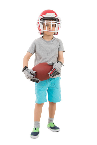 Boy In Sports Helmet Holding Rugby - Foto, imagen