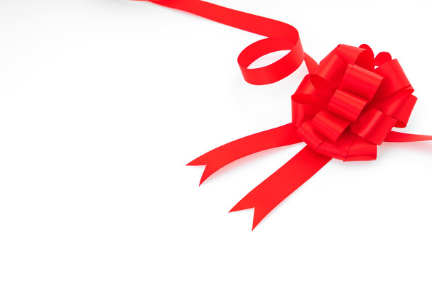 Shiny red ribbon on white background with copy space .  - Φωτογραφία, εικόνα