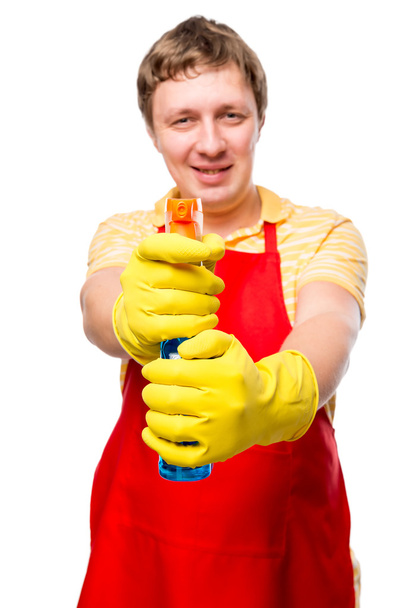 portrait of a man housewife with spray for washing of glasses on - Photo, Image