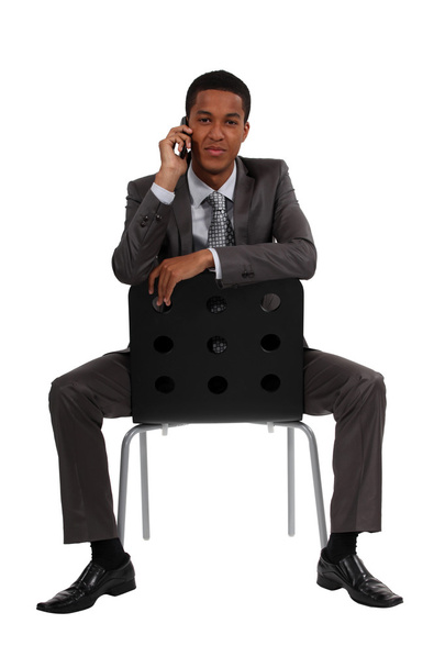 Businessman sat casually during call - Fotoğraf, Görsel