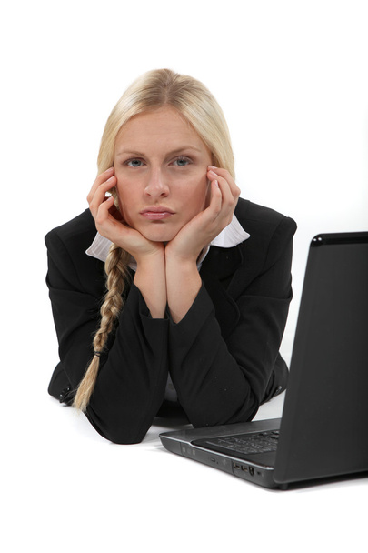 Bored blond office worker - Foto, afbeelding