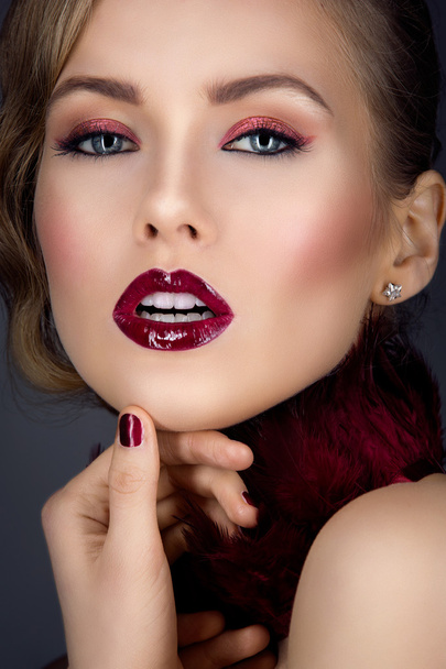 Beautiful girl with red makeup - Фото, изображение