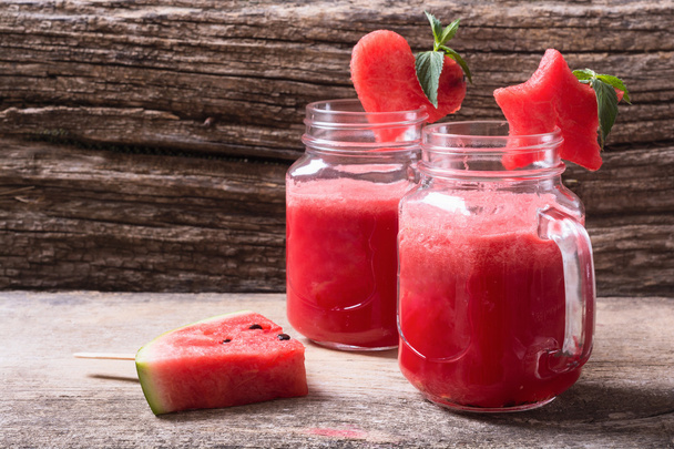 Watermelon drink in glasses with slices of watermelon - Valokuva, kuva