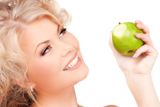 Young beautiful woman with green apple - Fotoğraf, Görsel