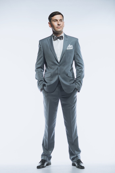 Portrait of a elegant handsome business man on white background - Foto, imagen