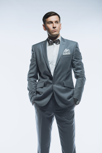 Portrait of a elegant handsome business man on white background - Valokuva, kuva