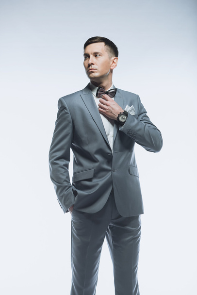 Portrait of a elegant handsome business man on white background - Foto, afbeelding