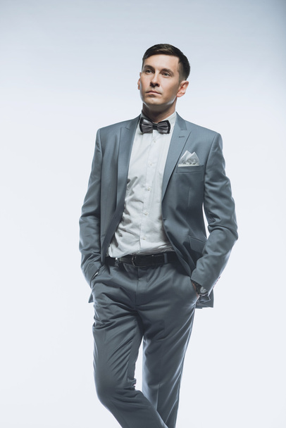 Portrait of a elegant handsome business man on white background - Foto, Imagem