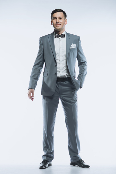 Portrait of a elegant handsome business man on white background - Foto, Imagem