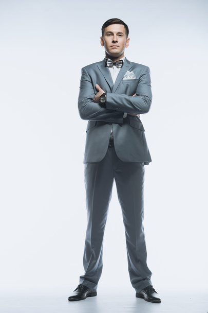 Portrait of a elegant handsome business man on white background - Foto, imagen