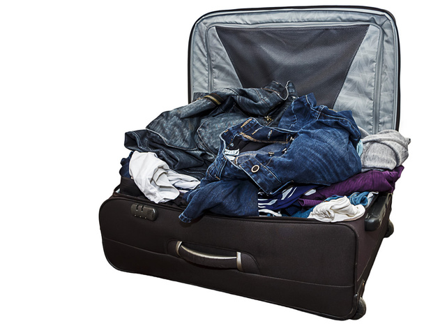 分離ひどく満員のスーツケース - 写真・画像